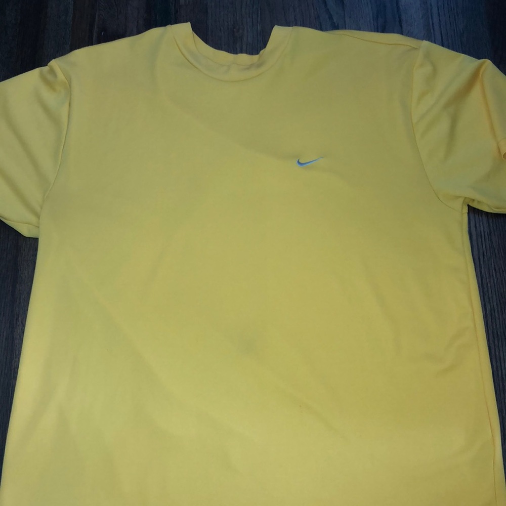 yellow nike shirt